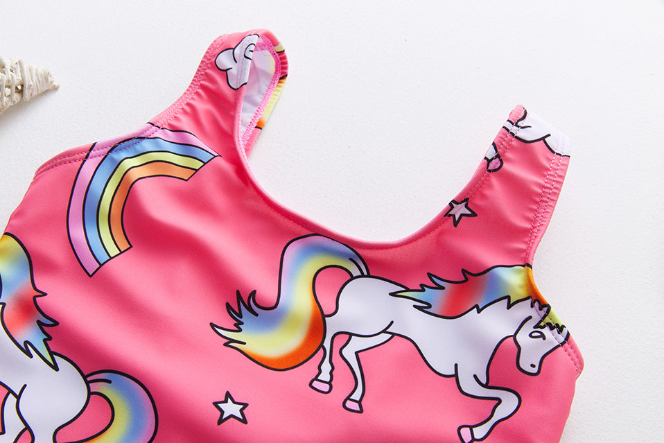 GIRLS SWIMSUIT WITH UNICORNS CLOSE UP TOP SIDE
